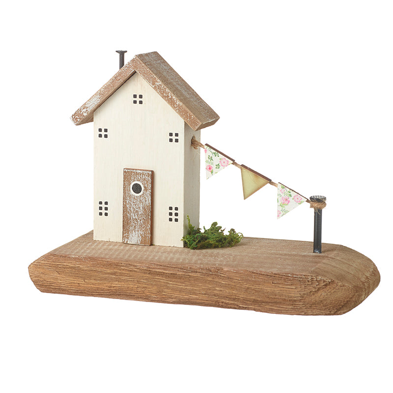Wooden House With Flag Garland