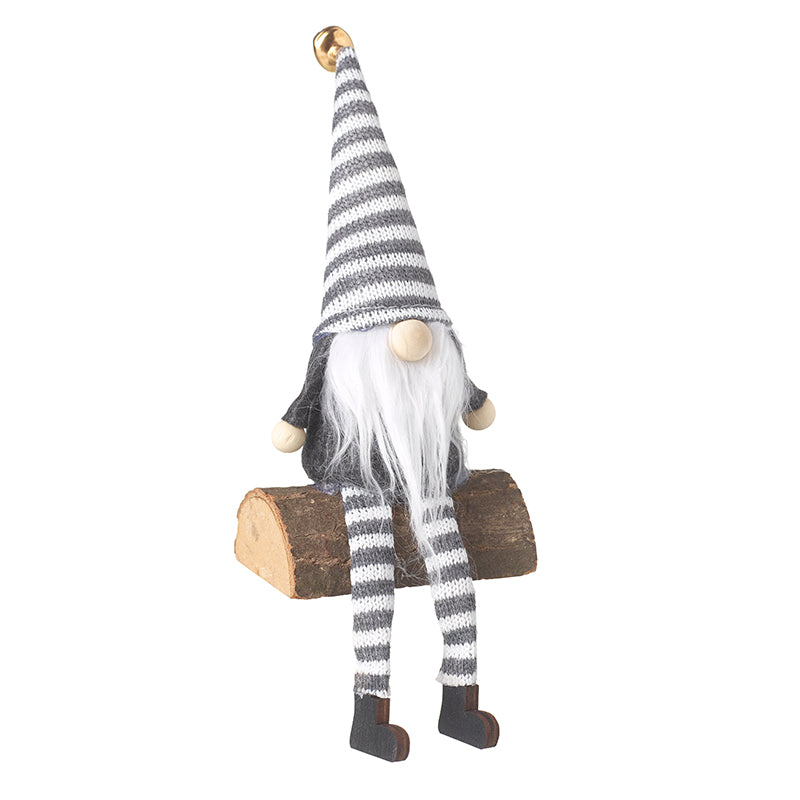 Grey & White Gonk Sitting On Log