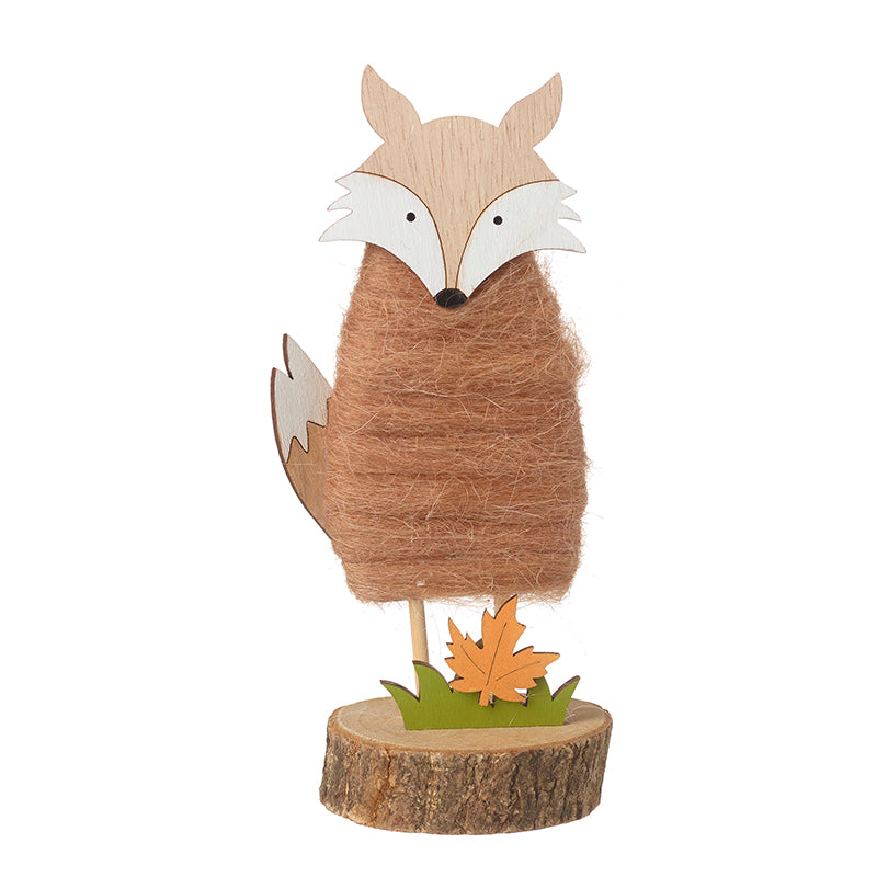 Standing Wooden Fox On Log Slice